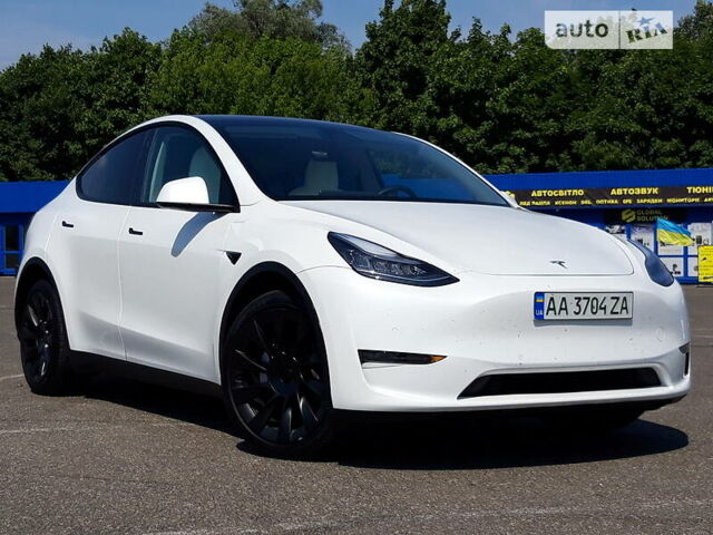 Белый Тесла Model Y, объемом двигателя 0 л и пробегом 18 тыс. км за 59500 $, фото 1 на Automoto.ua