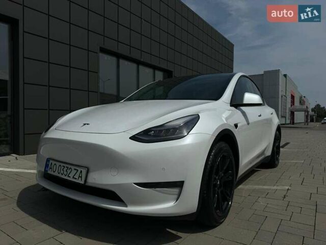Белый Тесла Model Y, объемом двигателя 0 л и пробегом 60 тыс. км за 30000 $, фото 1 на Automoto.ua