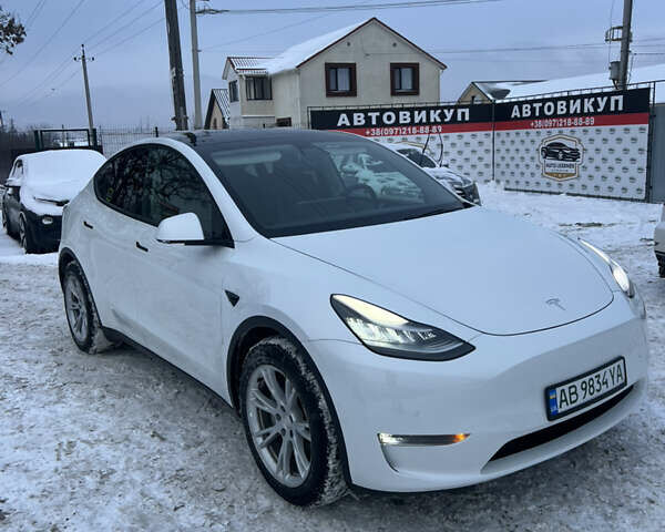 Белый Тесла Model Y, объемом двигателя 0 л и пробегом 128 тыс. км за 19999 $, фото 1 на Automoto.ua