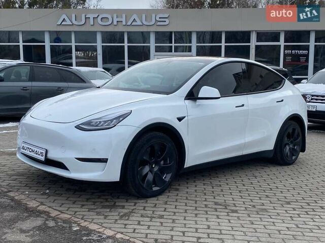 Белый Тесла Model Y, объемом двигателя 0 л и пробегом 75 тыс. км за 28300 $, фото 1 на Automoto.ua