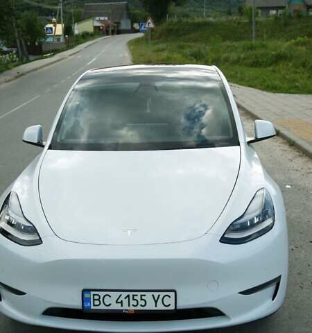 Белый Тесла Model Y, объемом двигателя 0 л и пробегом 80 тыс. км за 24000 $, фото 1 на Automoto.ua