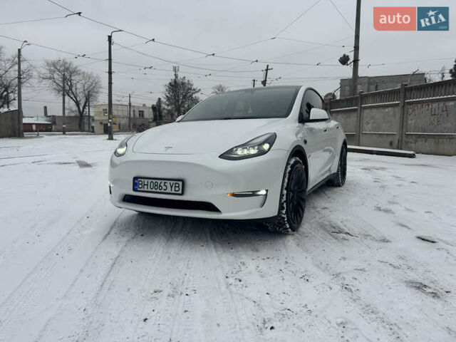 Білий Тесла Model Y, об'ємом двигуна 0 л та пробігом 64 тис. км за 22500 $, фото 1 на Automoto.ua