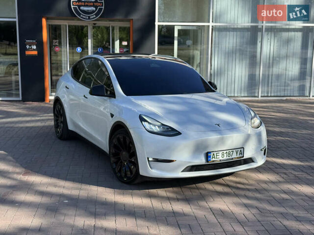 Белый Тесла Model Y, объемом двигателя 0 л и пробегом 84 тыс. км за 28000 $, фото 1 на Automoto.ua