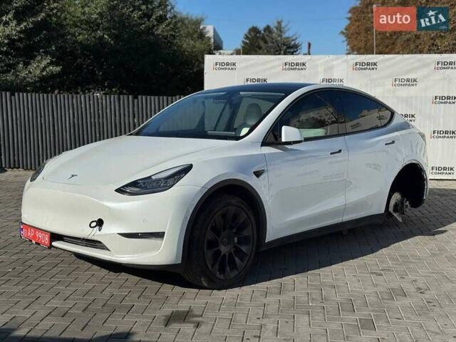 Білий Тесла Model Y, об'ємом двигуна 0 л та пробігом 123 тис. км за 15700 $, фото 1 на Automoto.ua