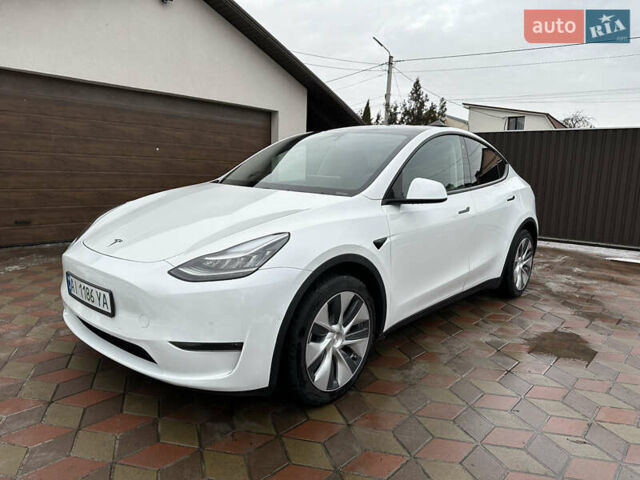 Белый Тесла Model Y, объемом двигателя 0 л и пробегом 76 тыс. км за 26900 $, фото 1 на Automoto.ua