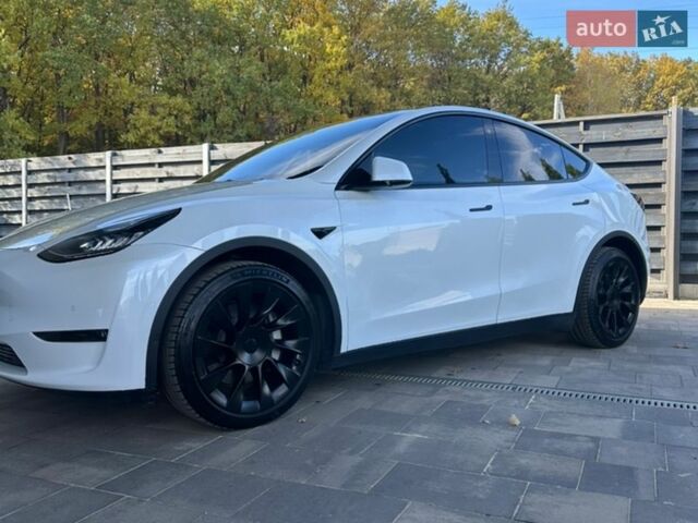 Белый Тесла Model Y, объемом двигателя 0 л и пробегом 80 тыс. км за 25299 $, фото 1 на Automoto.ua