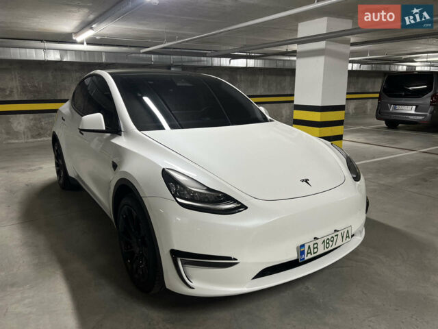Белый Тесла Model Y, объемом двигателя 0 л и пробегом 90 тыс. км за 23000 $, фото 1 на Automoto.ua
