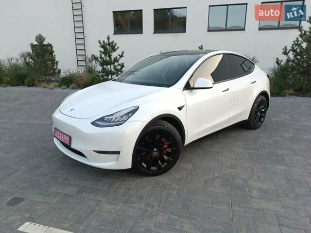 Белый Тесла Model Y, объемом двигателя 0 л и пробегом 128 тыс. км за 19600 $, фото 1 на Automoto.ua