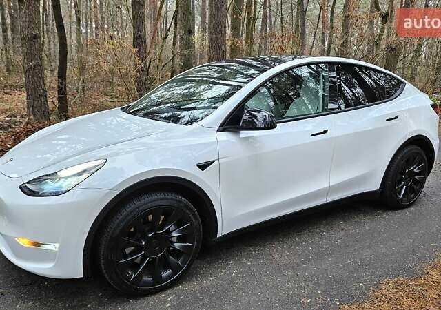 Белый Тесла Model Y, объемом двигателя 0 л и пробегом 71 тыс. км за 27900 $, фото 1 на Automoto.ua