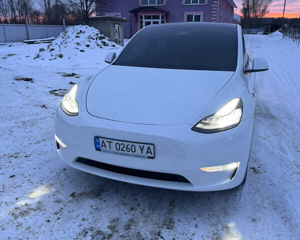 Белый Тесла Model Y, объемом двигателя 0 л и пробегом 97 тыс. км за 28900 $, фото 1 на Automoto.ua