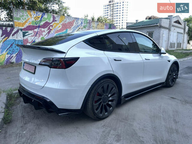 Белый Тесла Model Y, объемом двигателя 0 л и пробегом 68 тыс. км за 36000 $, фото 1 на Automoto.ua