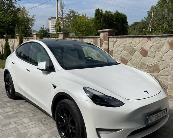 Белый Тесла Model Y, объемом двигателя 0 л и пробегом 55 тыс. км за 28000 $, фото 1 на Automoto.ua