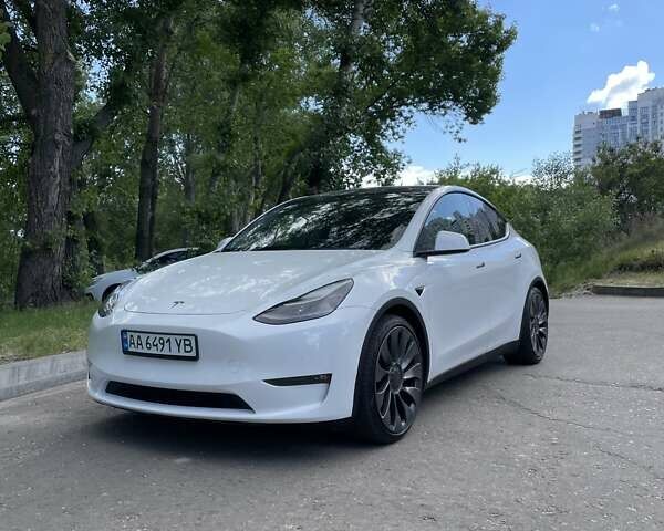 Білий Тесла Model Y, об'ємом двигуна 0 л та пробігом 52 тис. км за 34700 $, фото 1 на Automoto.ua