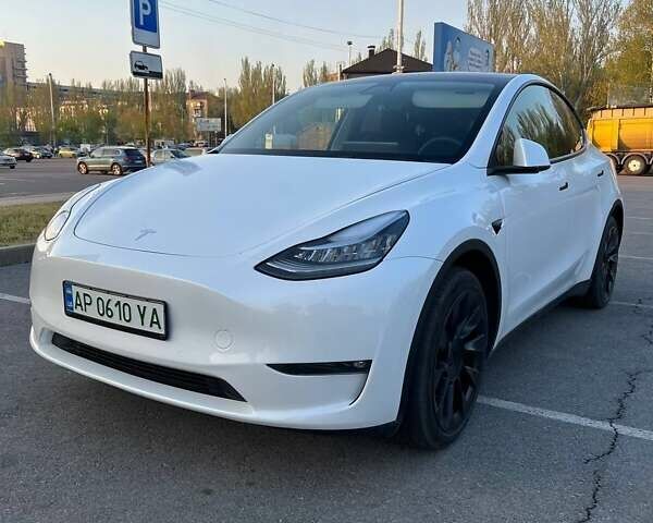 Білий Тесла Model Y, об'ємом двигуна 0 л та пробігом 67 тис. км за 26499 $, фото 1 на Automoto.ua