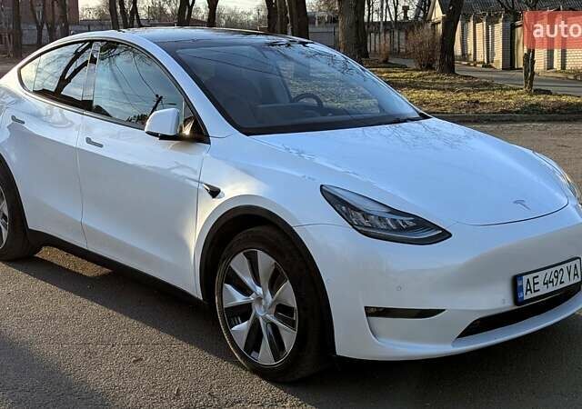 Білий Тесла Model Y, об'ємом двигуна 0 л та пробігом 101 тис. км за 23899 $, фото 1 на Automoto.ua