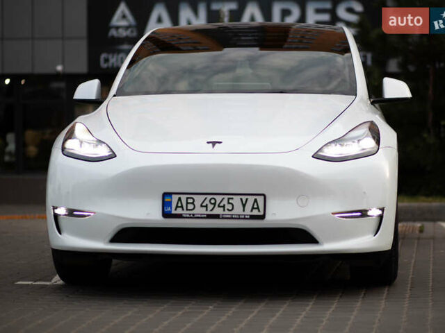 Белый Тесла Model Y, объемом двигателя 0 л и пробегом 55 тыс. км за 33000 $, фото 1 на Automoto.ua