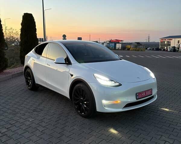 Белый Тесла Model Y, объемом двигателя 0 л и пробегом 84 тыс. км за 23700 $, фото 1 на Automoto.ua