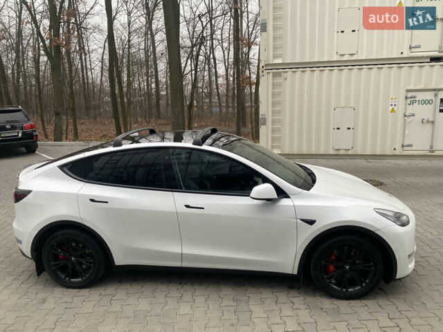 Белый Тесла Model Y, объемом двигателя 0 л и пробегом 52 тыс. км за 26500 $, фото 1 на Automoto.ua