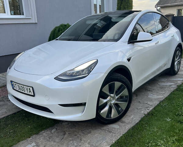 Белый Тесла Model Y, объемом двигателя 0 л и пробегом 58 тыс. км за 26800 $, фото 1 на Automoto.ua