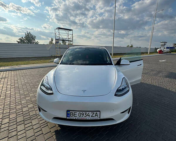 Белый Тесла Model Y, объемом двигателя 0 л и пробегом 80 тыс. км за 24000 $, фото 1 на Automoto.ua