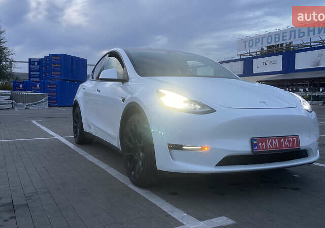 Белый Тесла Model Y, объемом двигателя 0 л и пробегом 81 тыс. км за 25000 $, фото 1 на Automoto.ua
