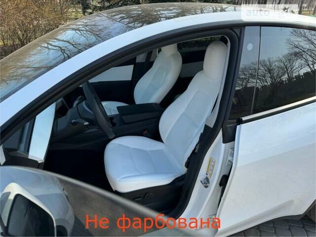 Белый Тесла Model Y, объемом двигателя 0 л и пробегом 56 тыс. км за 40500 $, фото 1 на Automoto.ua