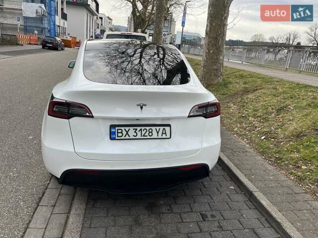 Білий Тесла Model Y, об'ємом двигуна 0 л та пробігом 49 тис. км за 28500 $, фото 1 на Automoto.ua
