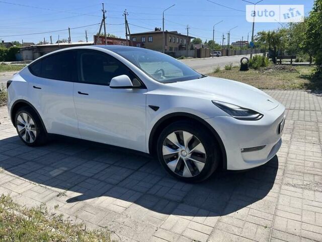 Белый Тесла Model Y, объемом двигателя 0 л и пробегом 35 тыс. км за 25599 $, фото 1 на Automoto.ua