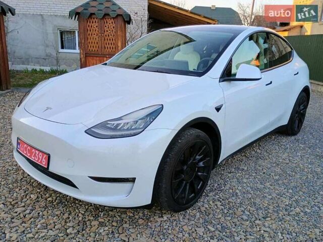Белый Тесла Model Y, объемом двигателя 0 л и пробегом 68 тыс. км за 22500 $, фото 1 на Automoto.ua