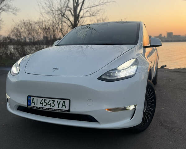 Білий Тесла Model Y, об'ємом двигуна 0 л та пробігом 55 тис. км за 24990 $, фото 1 на Automoto.ua