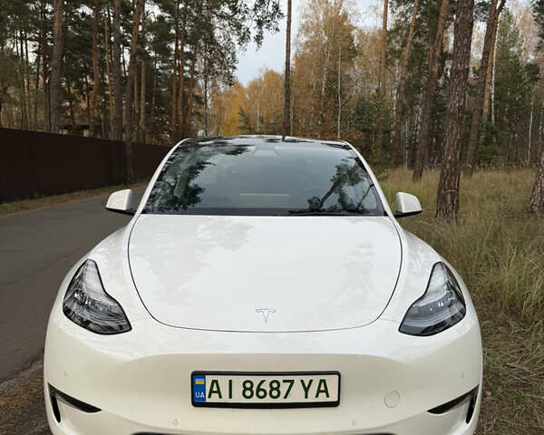 Белый Тесла Model Y, объемом двигателя 0 л и пробегом 141 тыс. км за 20900 $, фото 1 на Automoto.ua