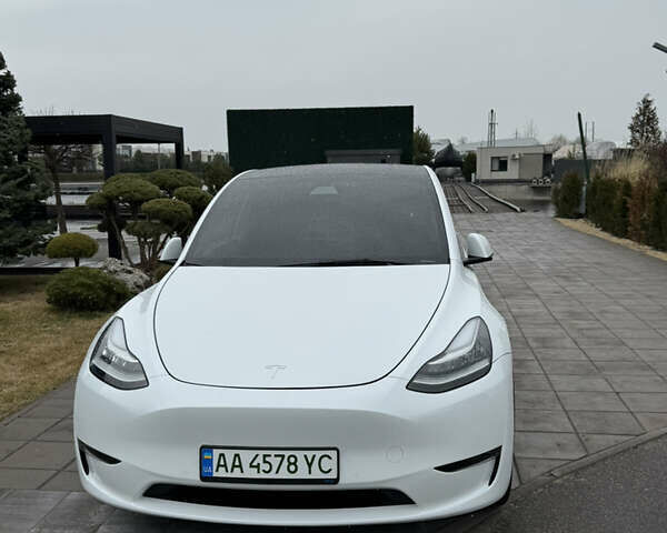 Білий Тесла Model Y, об'ємом двигуна 0 л та пробігом 39 тис. км за 25900 $, фото 1 на Automoto.ua