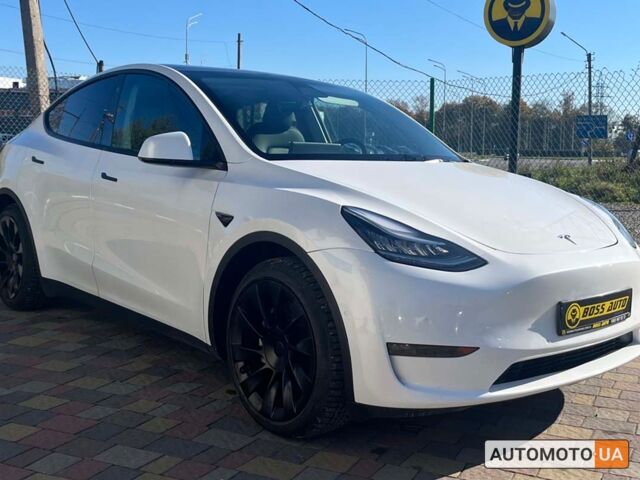 Белый Тесла Model Y, объемом двигателя 75 л и пробегом 23 тыс. км за 32500 $, фото 1 на Automoto.ua