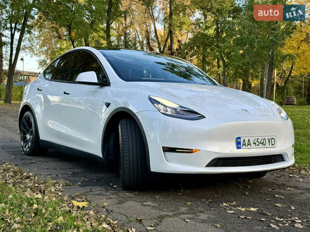 Белый Тесла Model Y, объемом двигателя 0 л и пробегом 99 тыс. км за 25499 $, фото 1 на Automoto.ua