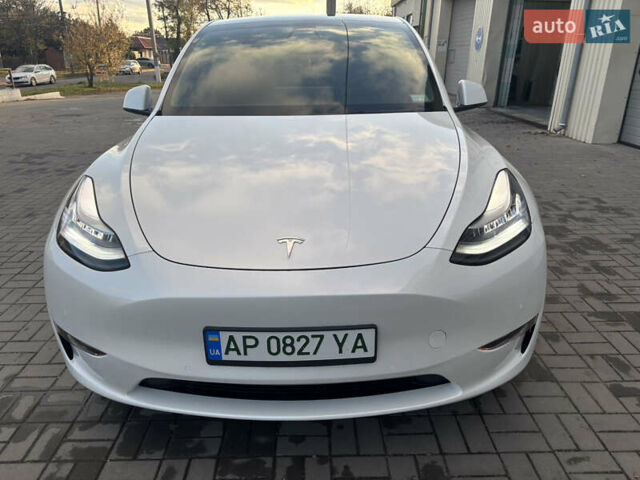Белый Тесла Model Y, объемом двигателя 0 л и пробегом 23 тыс. км за 28000 $, фото 1 на Automoto.ua