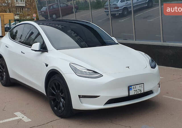 Білий Тесла Model Y, об'ємом двигуна 0 л та пробігом 74 тис. км за 25900 $, фото 1 на Automoto.ua