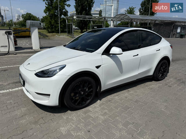 Белый Тесла Model Y, объемом двигателя 0 л и пробегом 106 тыс. км за 22800 $, фото 1 на Automoto.ua