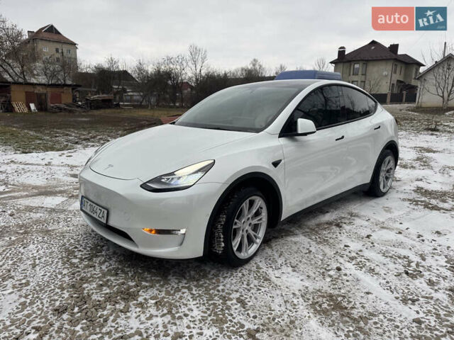 Белый Тесла Model Y, объемом двигателя 0 л и пробегом 60 тыс. км за 29900 $, фото 1 на Automoto.ua
