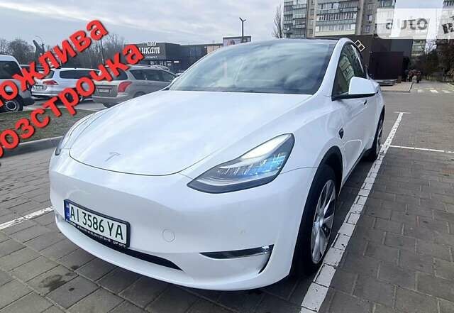 Білий Тесла Model Y, об'ємом двигуна 0 л та пробігом 63 тис. км за 29999 $, фото 1 на Automoto.ua