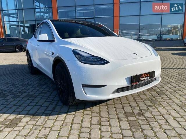 Білий Тесла Model Y, об'ємом двигуна 0 л та пробігом 54 тис. км за 21900 $, фото 1 на Automoto.ua