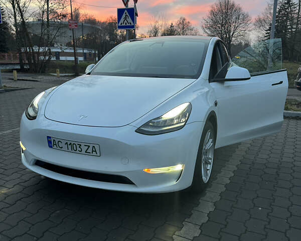 Белый Тесла Model Y, объемом двигателя 0 л и пробегом 57 тыс. км за 25900 $, фото 1 на Automoto.ua