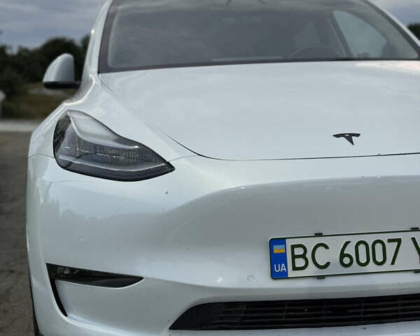 Белый Тесла Model Y, объемом двигателя 0 л и пробегом 79 тыс. км за 27899 $, фото 1 на Automoto.ua