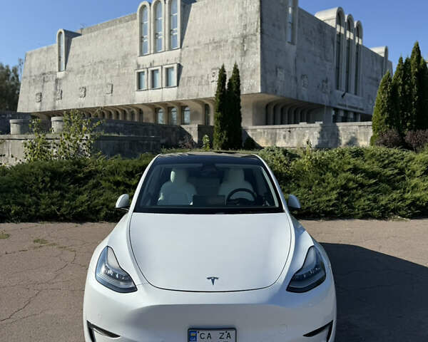 Белый Тесла Model Y, объемом двигателя 0 л и пробегом 72 тыс. км за 29000 $, фото 1 на Automoto.ua