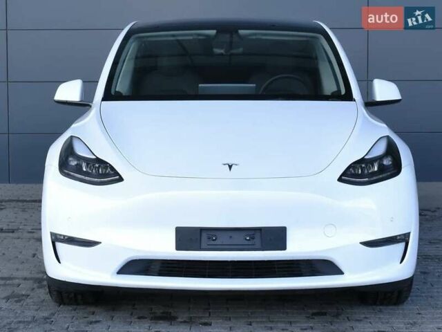 Белый Тесла Model Y, объемом двигателя 0 л и пробегом 71 тыс. км за 23000 $, фото 1 на Automoto.ua