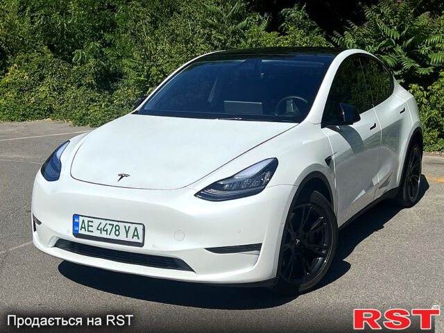 Белый Тесла Model Y, объемом двигателя 0 л и пробегом 63 тыс. км за 26500 $, фото 1 на Automoto.ua