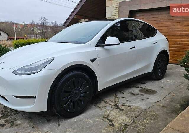 Белый Тесла Model Y, объемом двигателя 0 л и пробегом 99 тыс. км за 20000 $, фото 1 на Automoto.ua