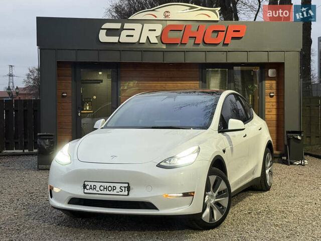Белый Тесла Model Y, объемом двигателя 0 л и пробегом 128 тыс. км за 22600 $, фото 1 на Automoto.ua