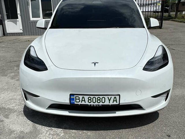 Белый Тесла Model Y, объемом двигателя 0 л и пробегом 93 тыс. км за 27999 $, фото 1 на Automoto.ua