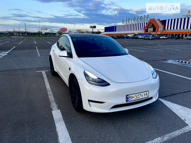 Белый Тесла Model Y, объемом двигателя 0 л и пробегом 97 тыс. км за 34500 $, фото 1 на Automoto.ua