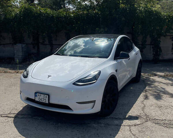 Тесла Model Y 2021 в Запорожье на Automoto.ua Белый Тесла Model Y, объемом двигателя 0 л и пробегом 84 тыс. км за 22000 $, фото 1 на Automoto.ua